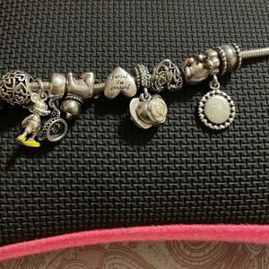 Authentic Pandora bracelet with charms :in excellent condition